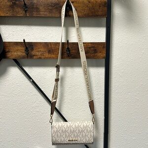 Michael Kors wallet with shoulder strap